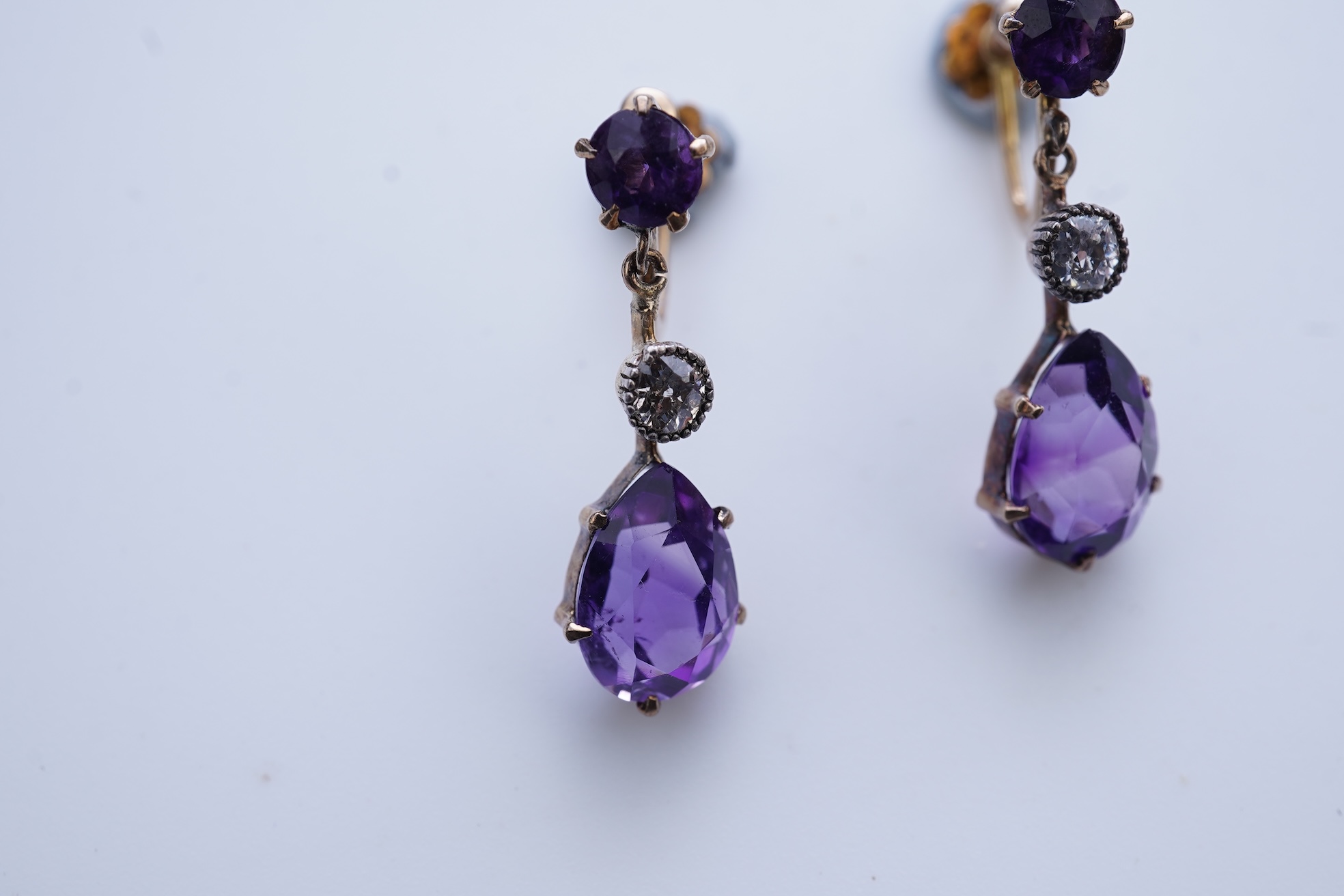 A pair of amethyst and diamond earrings, early 20th century